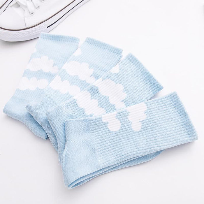 Pack of light blue cloud socks, white cloud pattern on ribbed knit legs