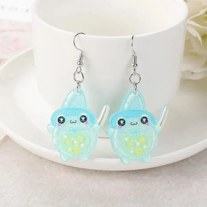 Blue frog face acrylic dangle earrings with heart detail and dangling ear shapes