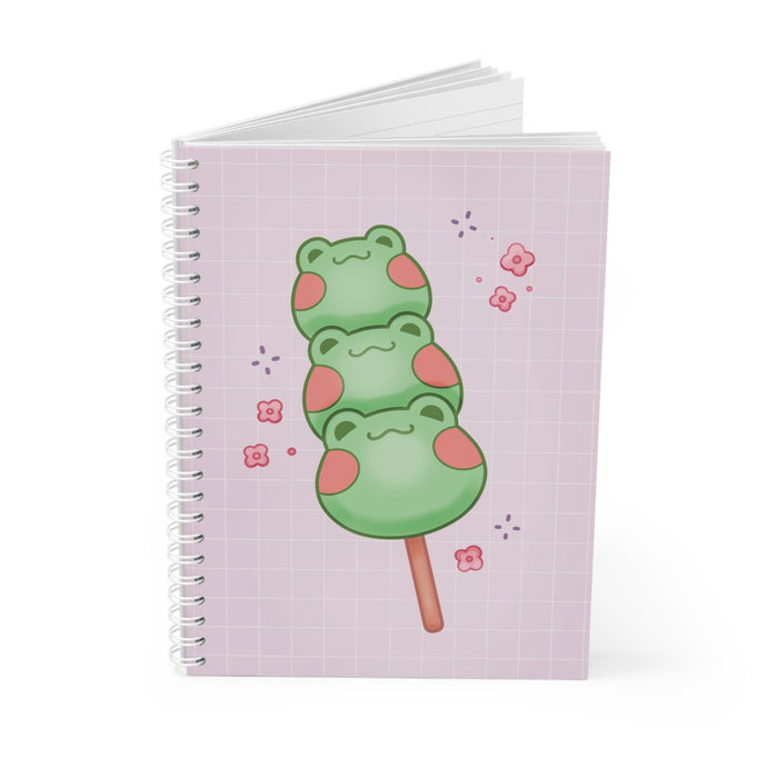 Stack of square spiral notebooks with lilac grid covers and green frog dango illustration