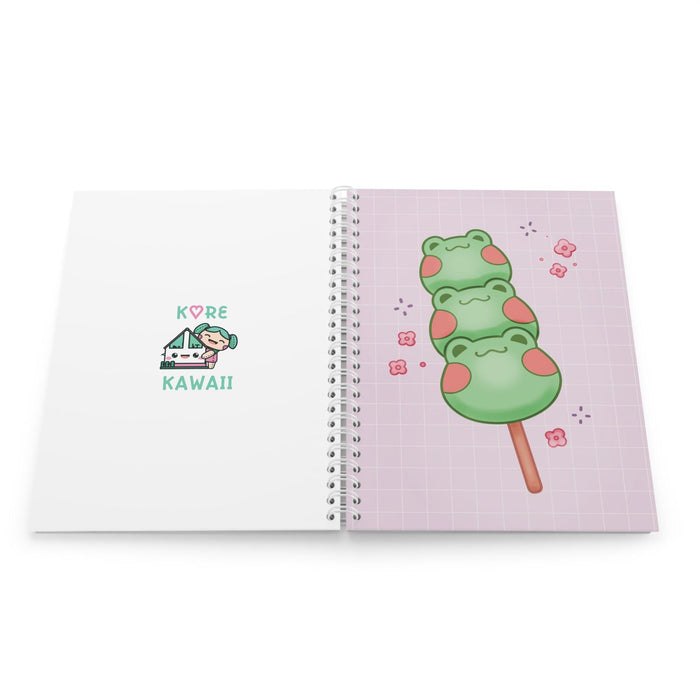 Open square spiral notebook with “KORE KAWAII” logo panel and lilac grid frog cover