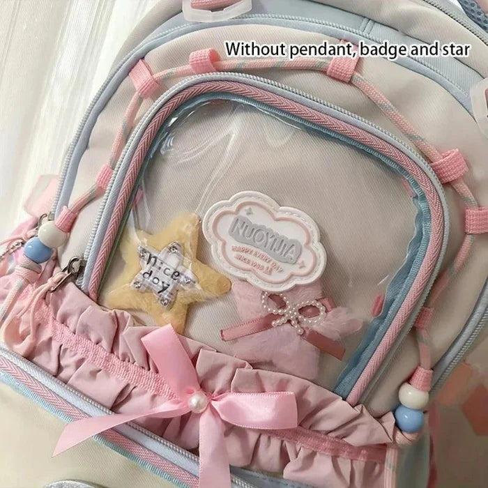 Pastel backpack front pocket lining with ruffled trim and small charm patch.