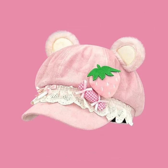 Pink bear-ear cap with strawberry appliqué, gingham bow, and scalloped lace trim