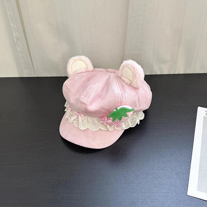 Pink bear-ear cap with strawberry appliqué and scalloped lace trim