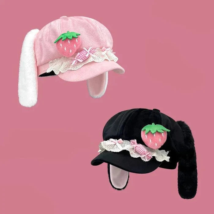 Pink strawberry bunny hat with lace ruffle band, pink bow, and white fuzzy ear flaps