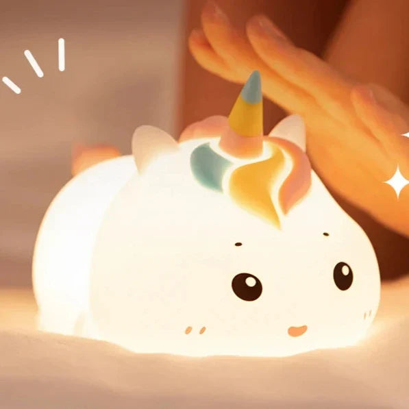 White unicorn night light, glowing horn and swirl accents