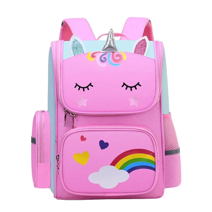 Pink unicorn backpack with rainbow and cloud front graphic, front zipper pocket, side pouch.