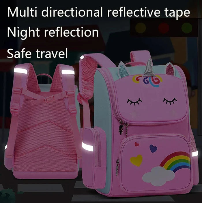 Pink unicorn backpack with reflective details on straps and front, rainbow and cloud design.