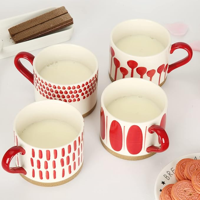 Hand-painted ceramic mugs set, white with red drop-and-dot motifs and red handles