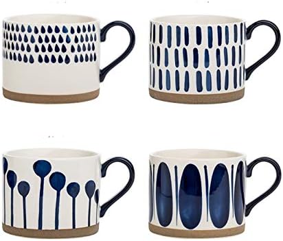 Set of 4 large porcelain mugs with navy and blue pattern designs, black handles