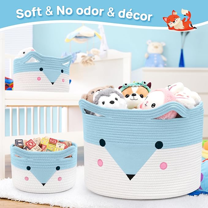 Blue-and-white woven baby blanket storage baskets with animal face design, holding stuffed animals.