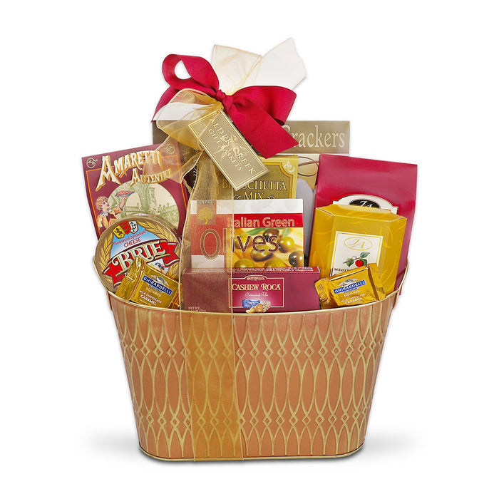 Gold wicker gift basket packed with assorted cheese, olives, crackers, and snack packs; red ribbon