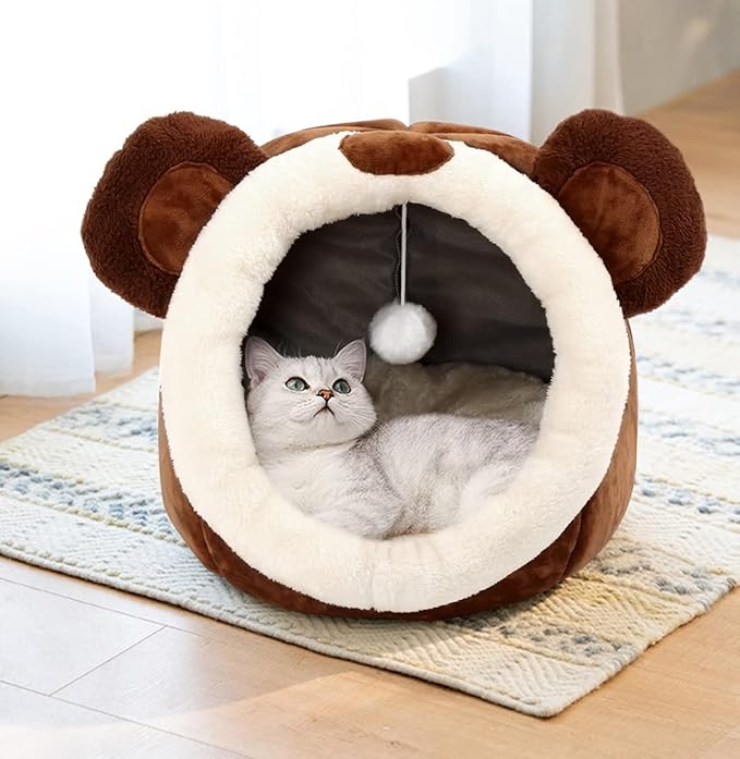 Brown bear-ear cat bed cave with plush cream rim and kitten sleeping inside