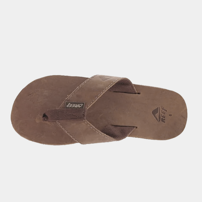 Reef Leather Smoothy Flip Flops in brown leather with stitched straps and embossed logo, top view.
