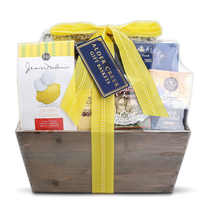 Wooden gift tote with yellow ribbon, lemon cookie box and tea gift set
