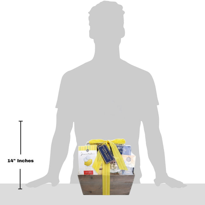 Gift tote holding assorted cookies and tea, shown with 14-inch size guide