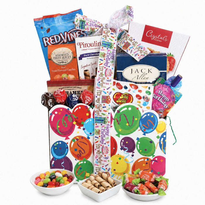 Birthday treats gift basket with wrapped sweets, balloon-pattern bags, and three snack bowls
