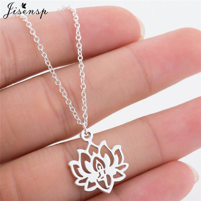 Silver lotus flower pendant necklace with cutout petal design on a chain