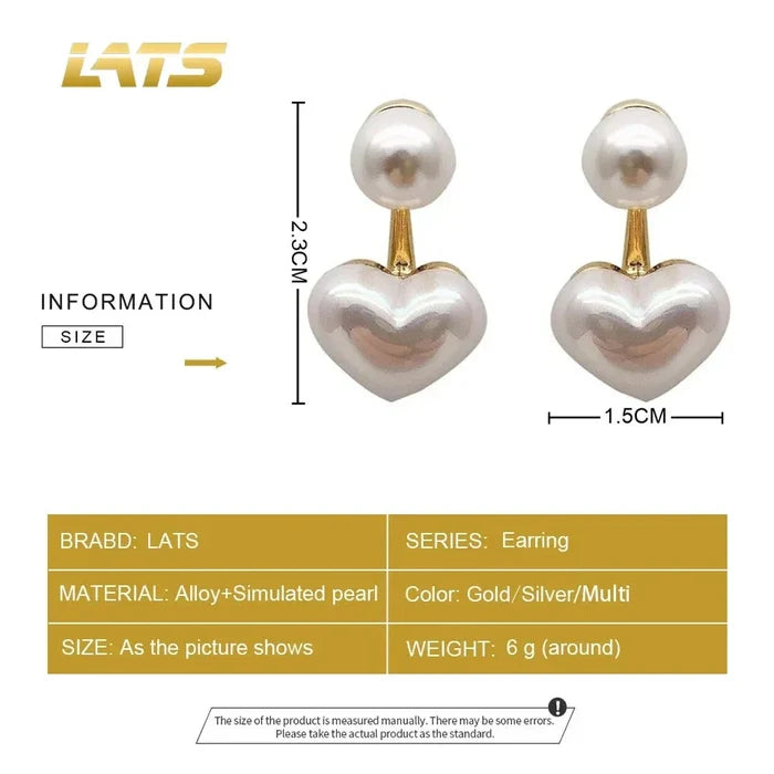 Gold-tone heart drop earrings with white faux pearl tops and heart charms