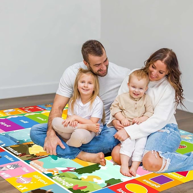 Colorful ABC number and animal play rug, family sitting and leaning on the mat