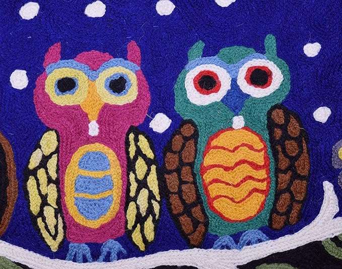 Blue wool lumbar pillow cover close-up of embroidered owls with white dot background