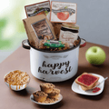 Happy harvest gift basket in white enamel bucket with mixes, jam jar, and pastries