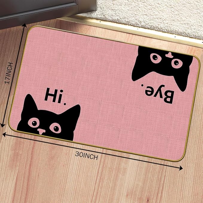 Pink welcome doormat with black cat faces and “Hi” text, 30 in by 17 in