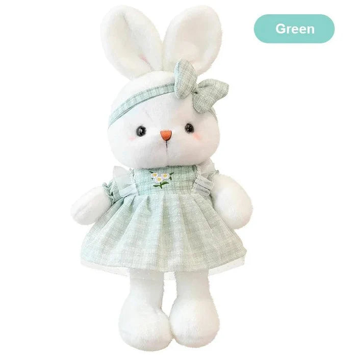 Green bunny plush doll with bow headband and mint green ruffled dress