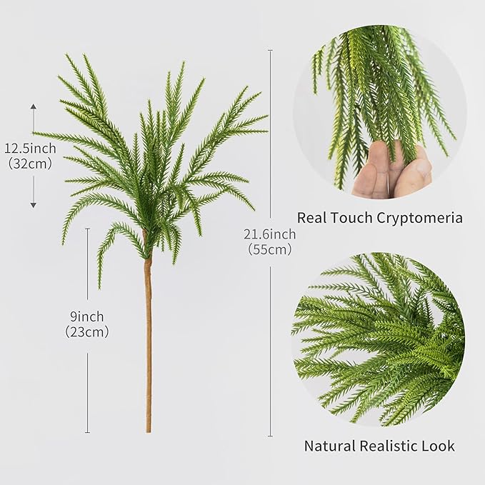 Green faux pine branch with realistic needle texture on a brown stem