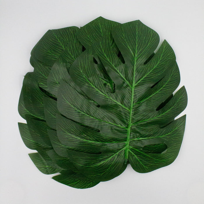 Layered monstera leaf cutout decoration, dark green with slit cutouts