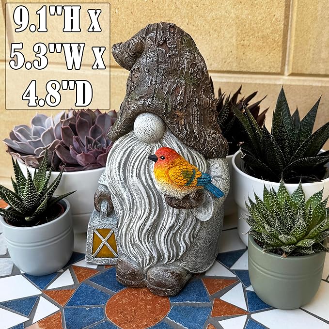 Garden gnome figurine with swirled gray robe and perched orange bird.
