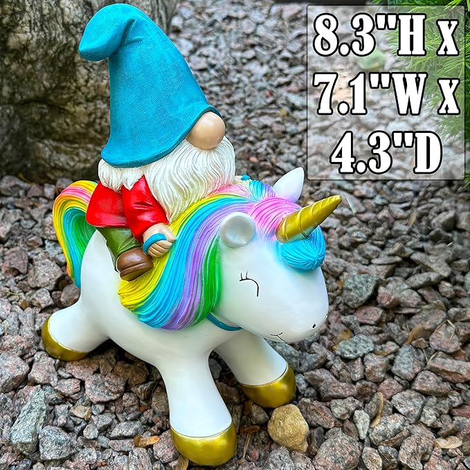 Unicorn garden statue with rainbow mane and closed eyes, gnome rider in red outfit