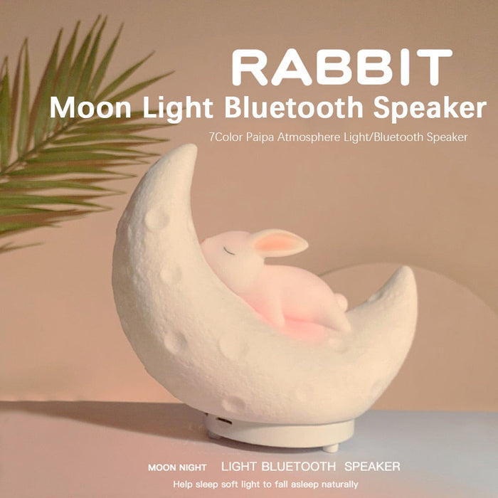 White moon bunny night light speaker with a soft glowing face in a crescent body