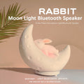 White moon bunny night light speaker with a soft glowing face in a crescent body