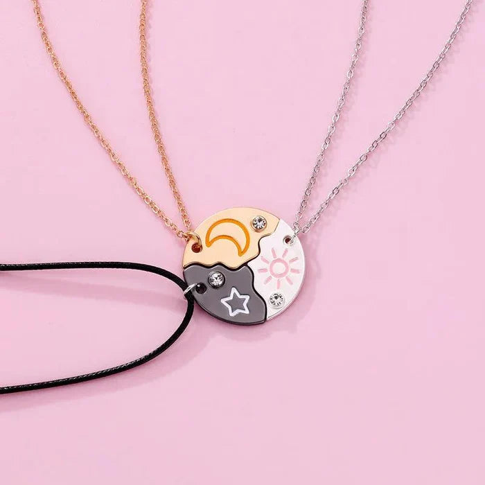 Friendship necklace with moon and star pendant; gold and silver chains with crystal details