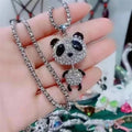 Panda rhinestone pendant necklace with silver chain and two-piece dangling panda charms.