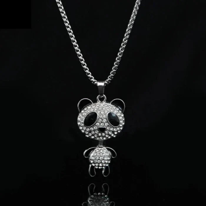 Panda rhinestone pendant necklace with two dangling panda charms on a silver chain.