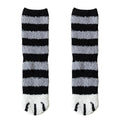 Pair of striped crew socks with black and light-gray horizontal bands and paw-print toes