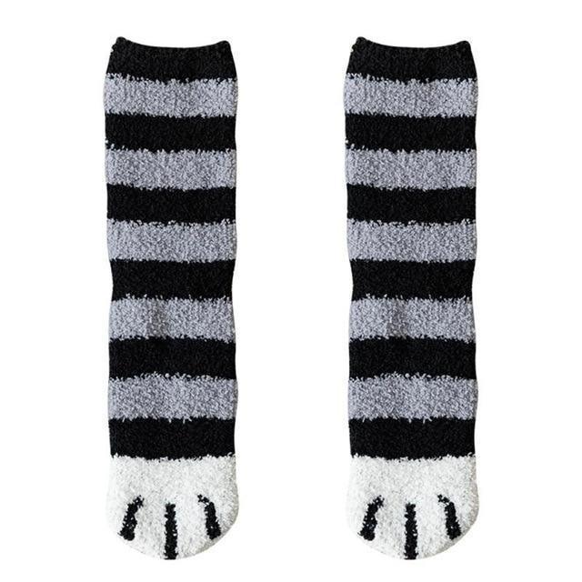 Pair of striped crew socks with black and light-gray horizontal bands and paw-print toes