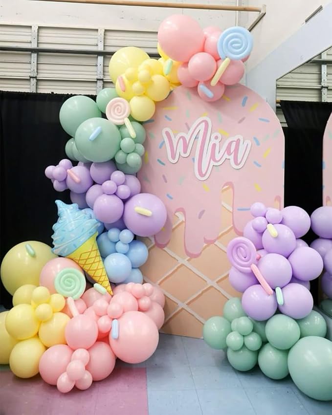 Pastel balloon arch garland with mint, lavender, yellow, pink, and light-blue balloon clusters
