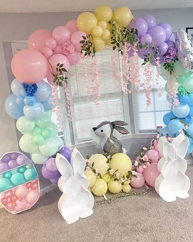 Pastel balloon arch garland with pink, blue, mint, and purple balloons framing an arch