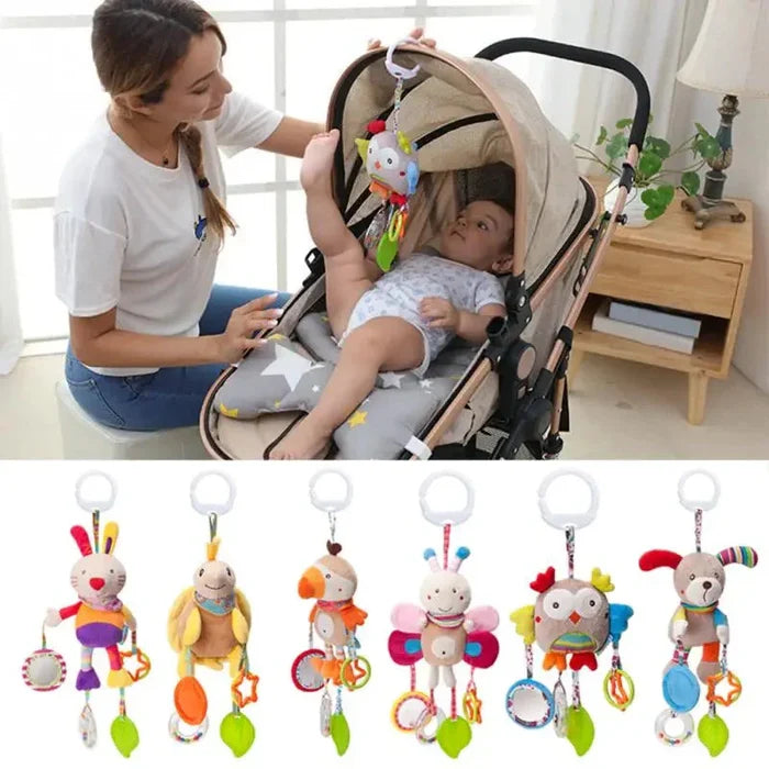 Plush stroller hanging rattle toys with colorful animal figures on a bar.