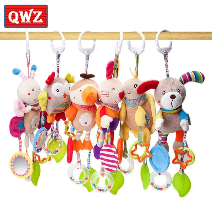 Set of hanging plush animal rattles with rings and crinkle parts on strings.