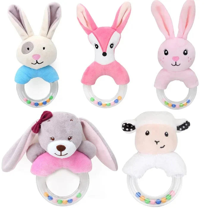Plush animal hanging rattles with fabric rings, including bunnies and a puppy