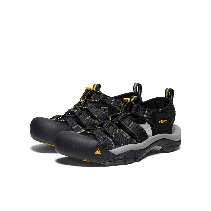 Keen Newport H2 sandals in black with yellow accents, quick-draw elastic lacing system, and durable toe cap, front angle view.