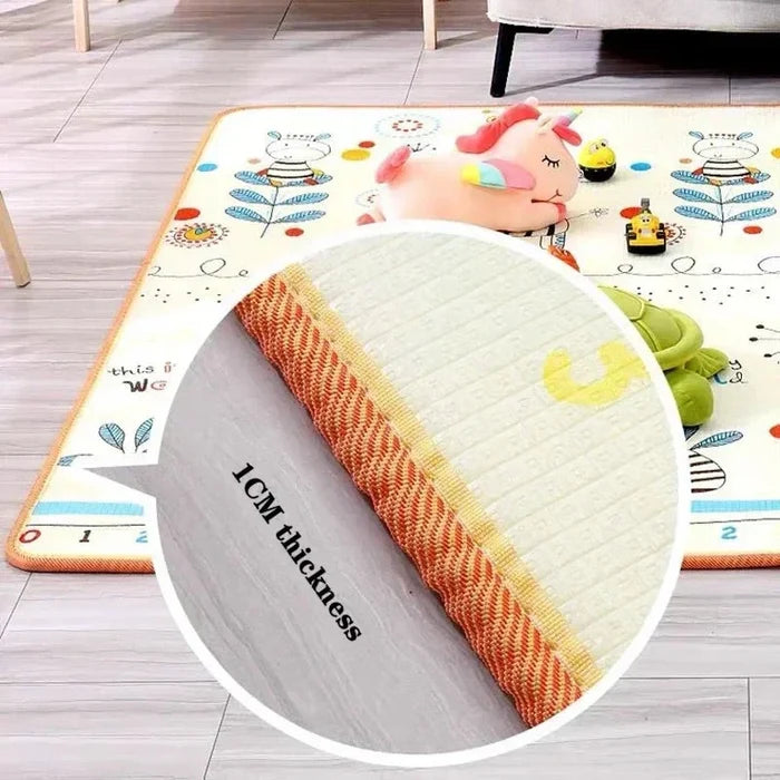 Folded baby play mat with colorful animal and forest cartoon design