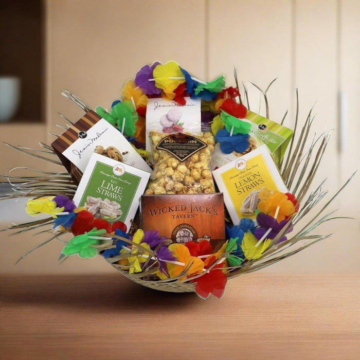 Gift basket filled with assorted packaged snacks, set with colorful shredded paper and straw