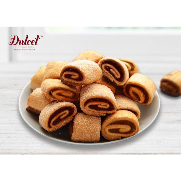 Rolled swirl cookies on a white plate