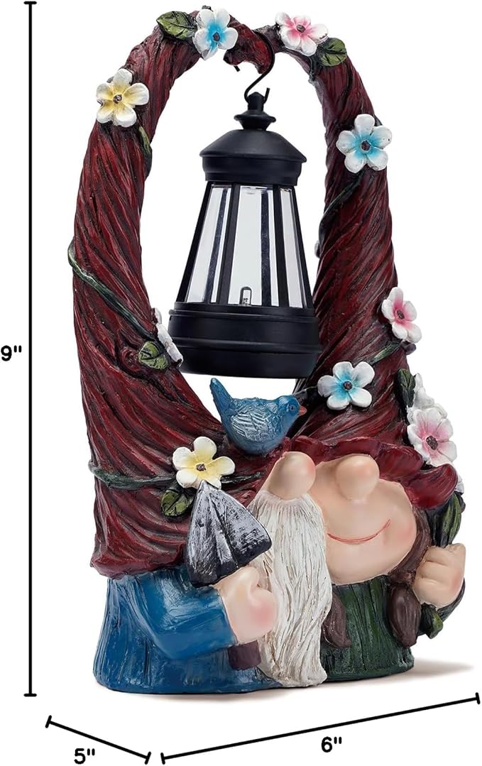 Resin gnome couple figurine with solar lantern; 6" wide x 9" tall dimensions