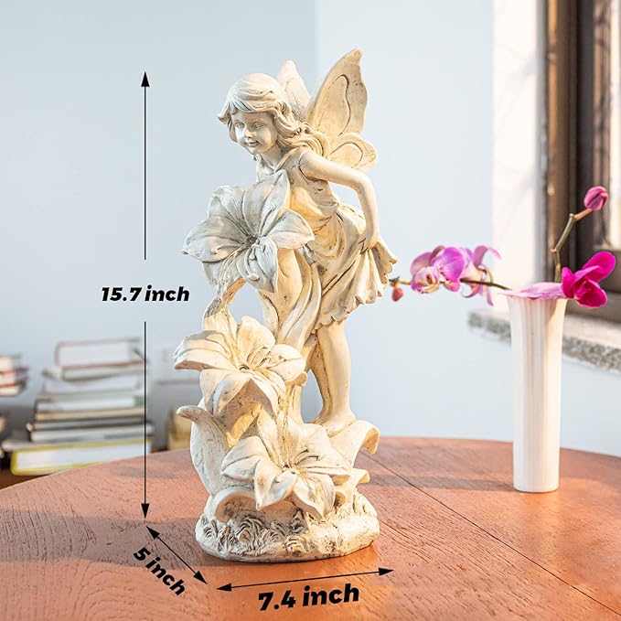 Cream resin solar fairy angel statue with flower blooms, size shown 7.4 x 15.7 in