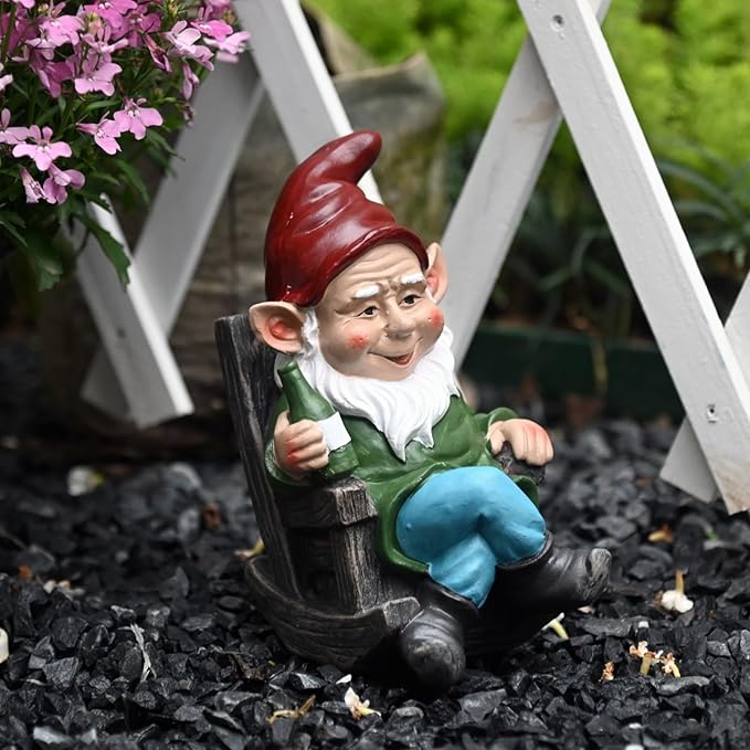 Garden gnome statue seated on a dark barrel, red hat, holding a wine bottle